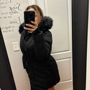 Michael kors coat with attached hand covers/gloves . Basically brand new.